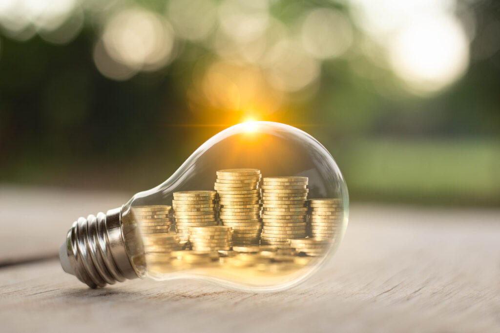 Stacks of coins inside a light bulb